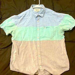 Multi color button up shirt barely worn
